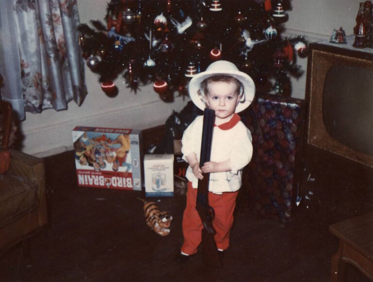 Desiree at Christmas with safari outfit.